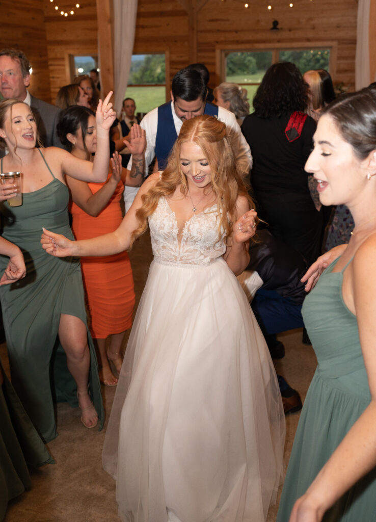 Bride dances after wedding reception.