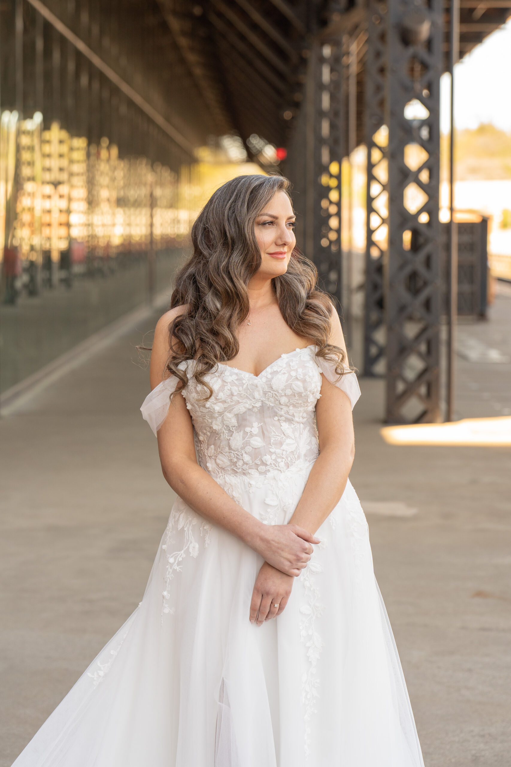 A bride posing for her bridal portraits at Main Street Station in downtown Richmond, Virginia.