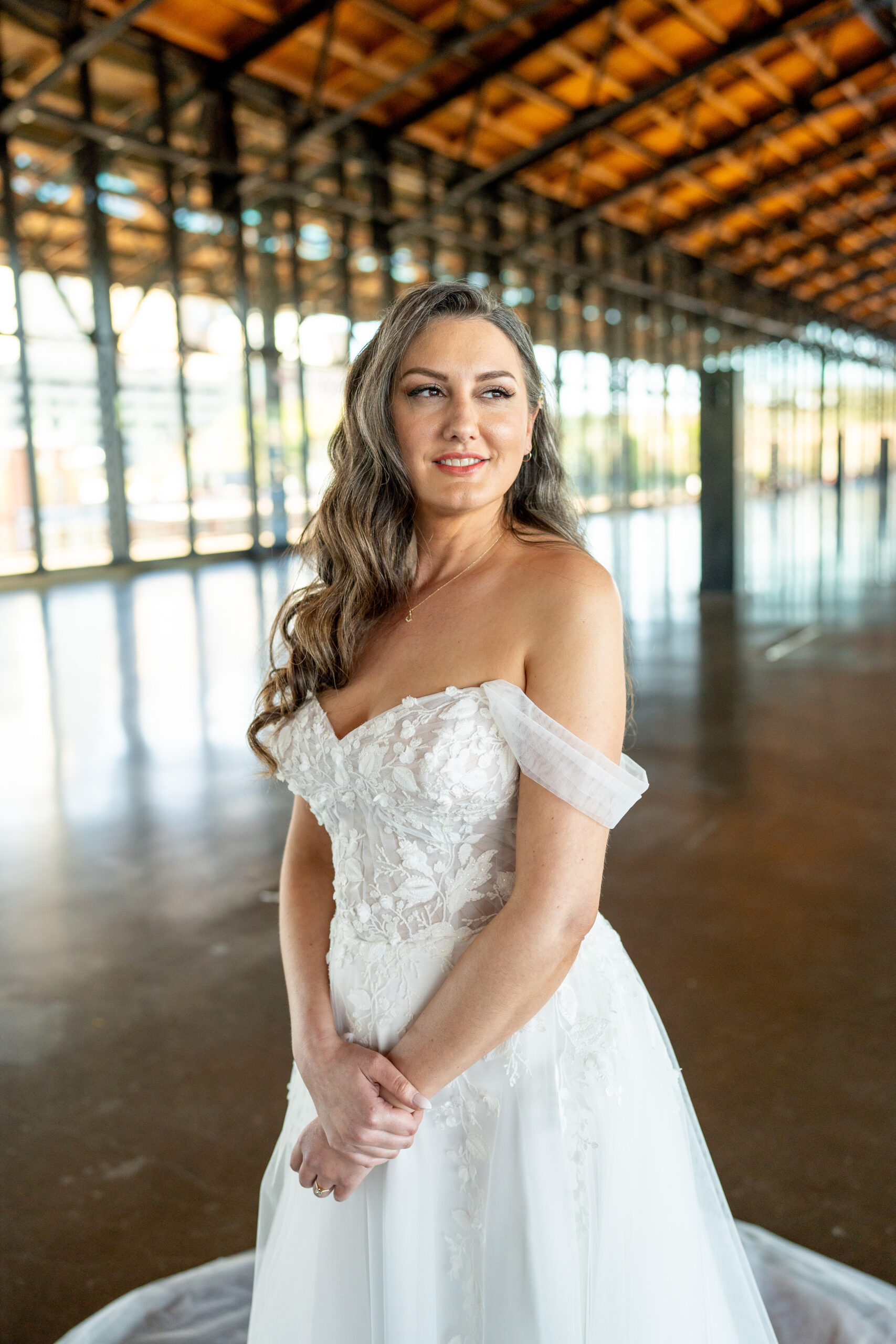 A bride at Main Street Station posing before her wedding ceremony.