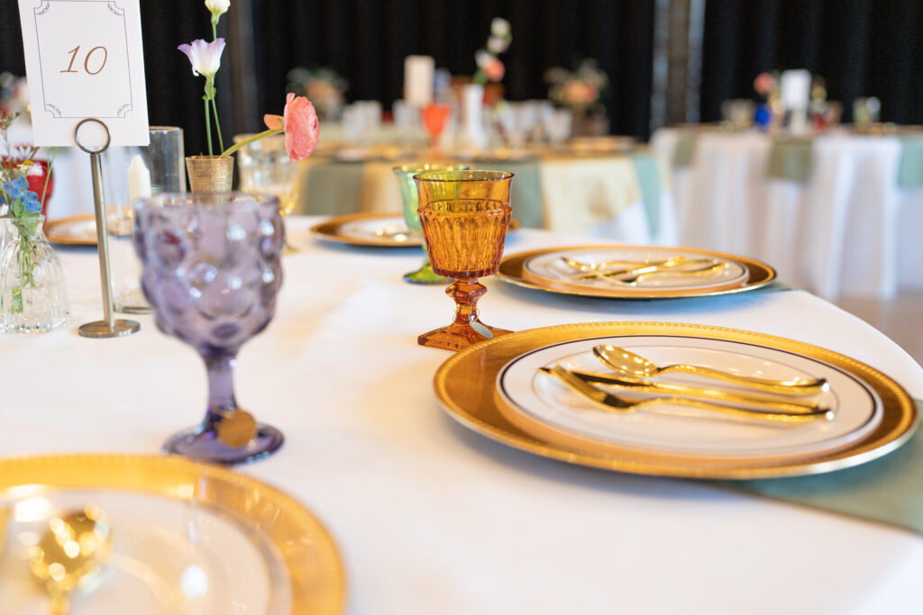 A main street station wedding decorations being displayed on their sweetheart table.