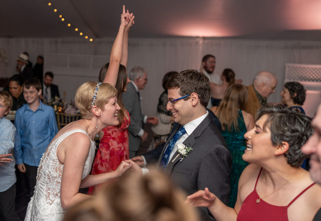 Bride and groom dancing in the Grand Pavilion tent at Mankin Mansion Richmond VA wedding reception